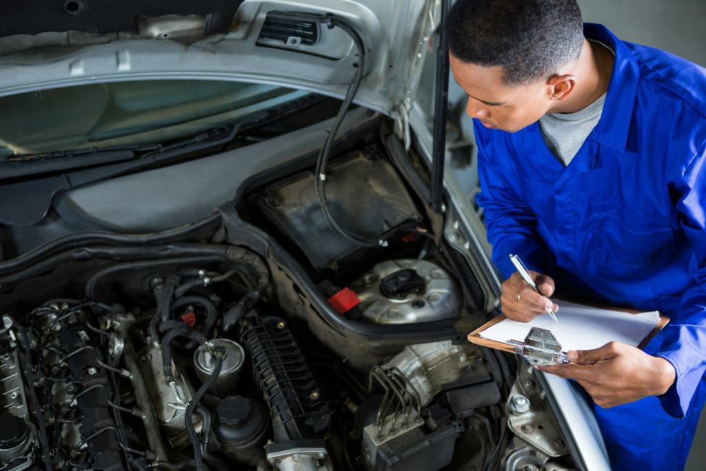 Chevrolet technician performing winter vehicle inspection